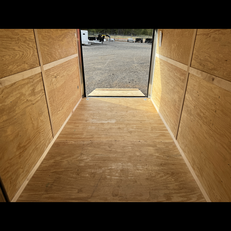 2026-homesteader-intrepid-716it-enclosed-cargo-trailer-black-side-interior-from-front